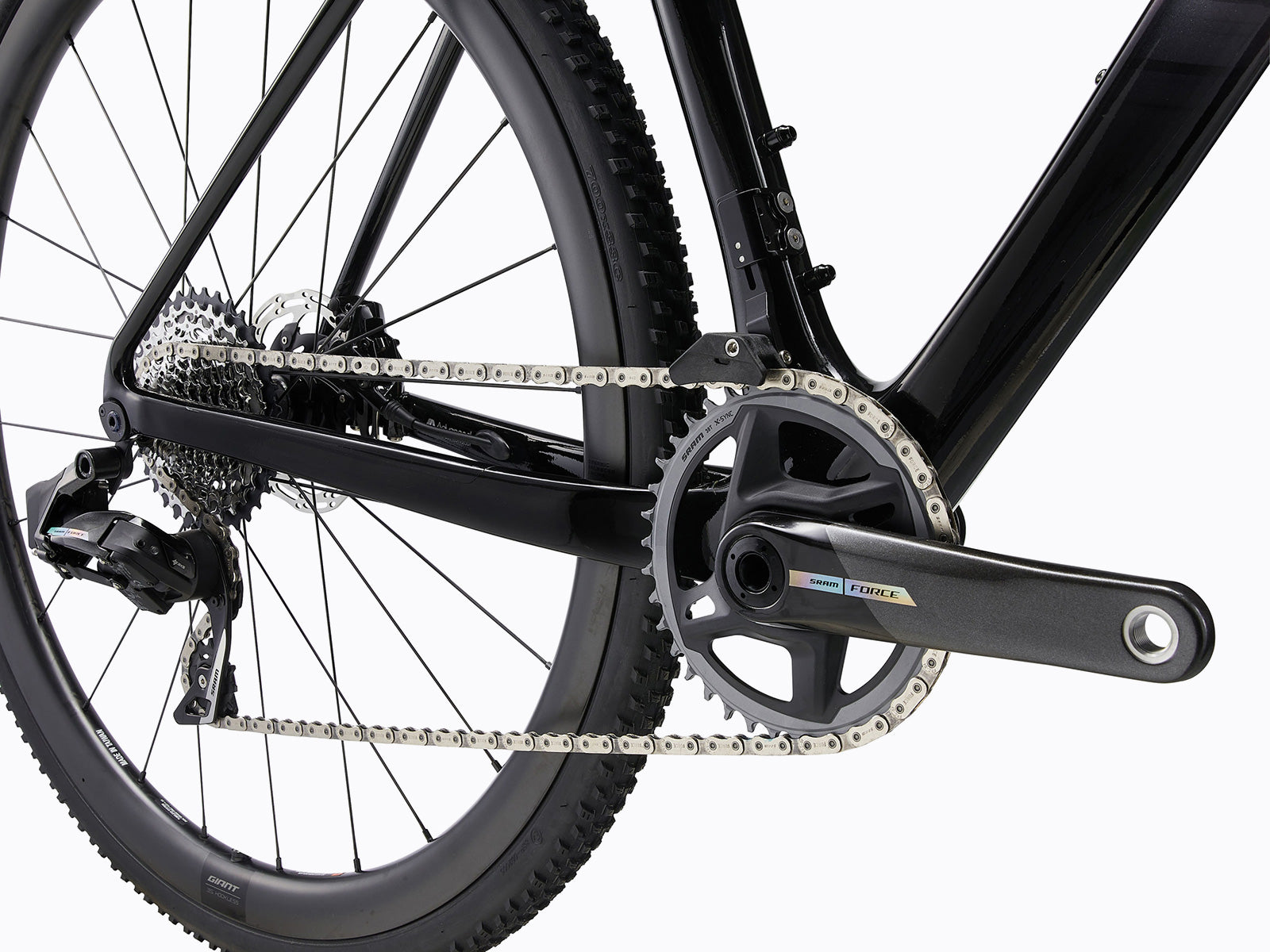 A mountain bike displaying its chain and chainring, illustrating the essential parts for performance on rough terrains.