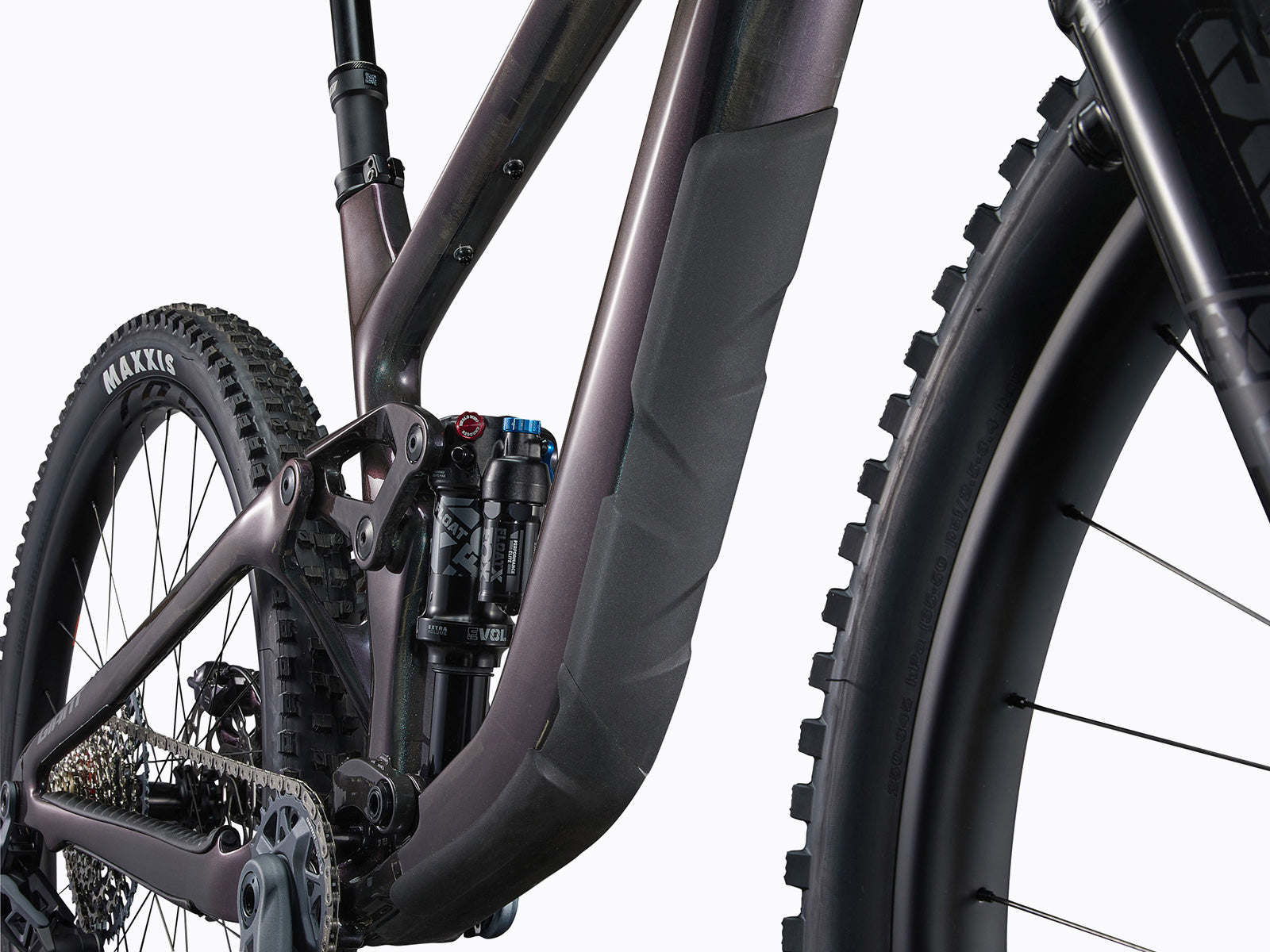 Detailed close-up of a bicycle's rear suspension system, highlighting its mechanics and functionality for improved ride comfort.