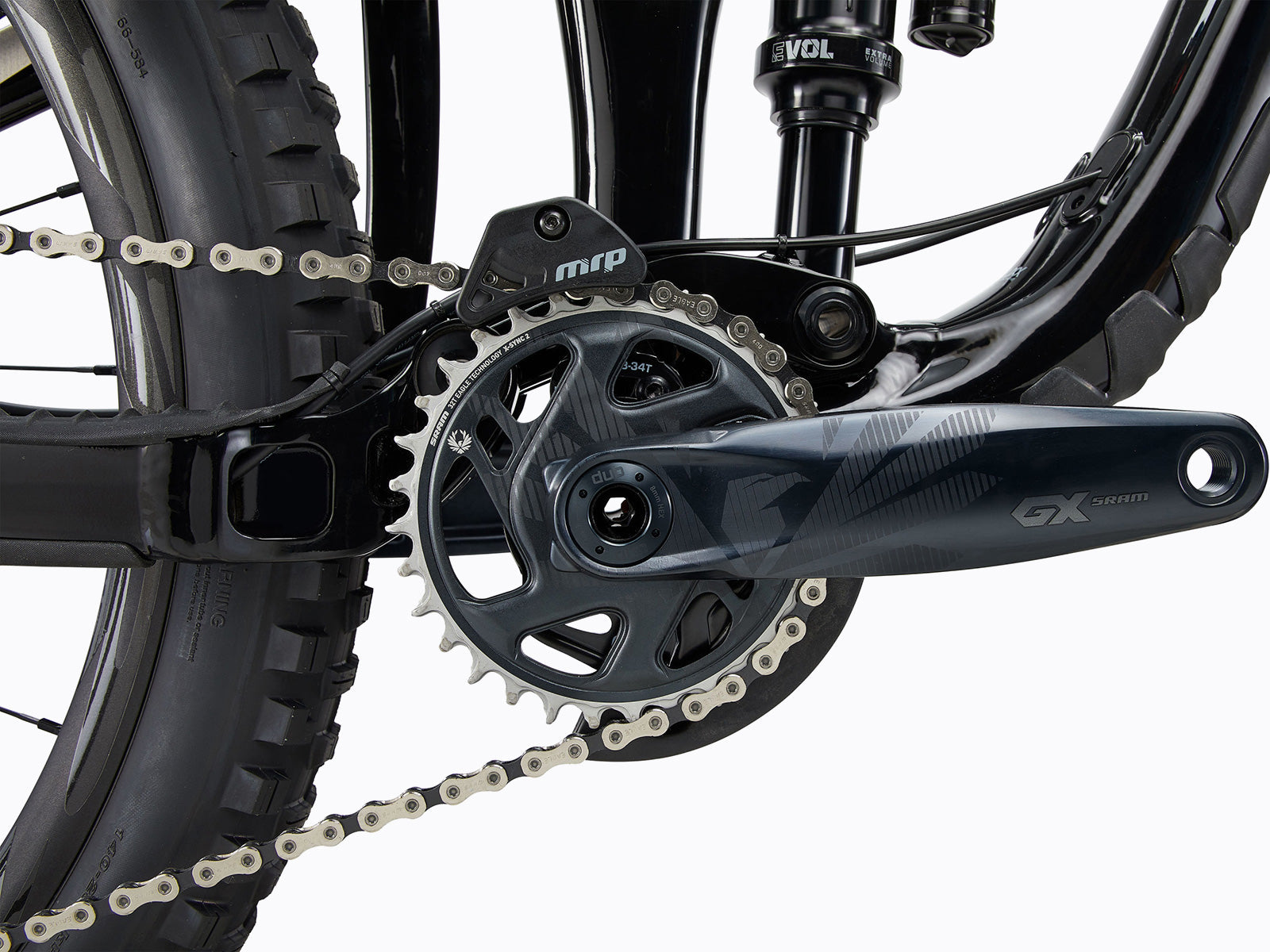 A mountain bike displaying its chain and chainring, illustrating the essential parts for performance on rough terrains.