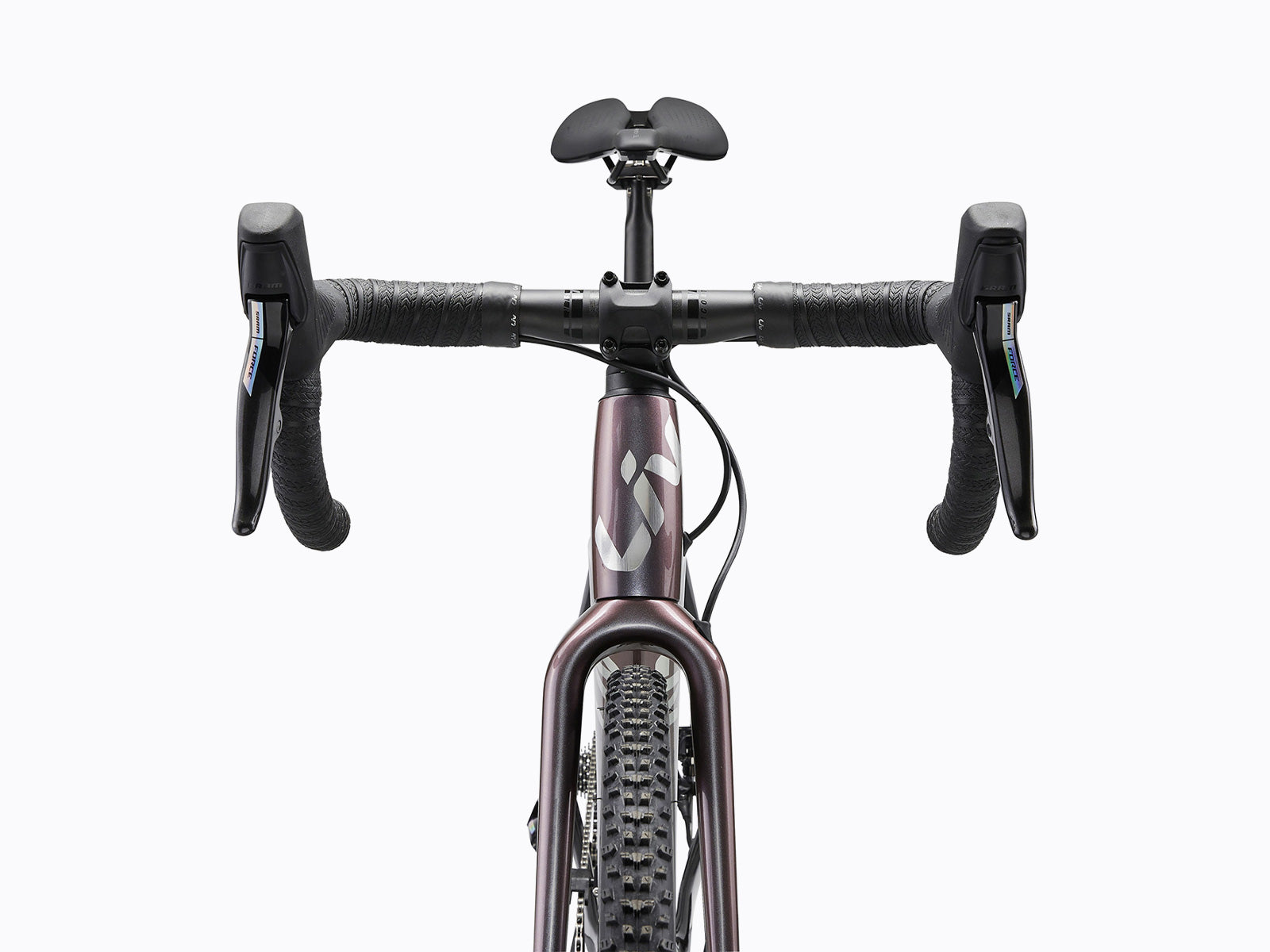 Close-up of a mountain bike's handlebar and stem, showcasing the grip and adjustment features for optimal riding control.