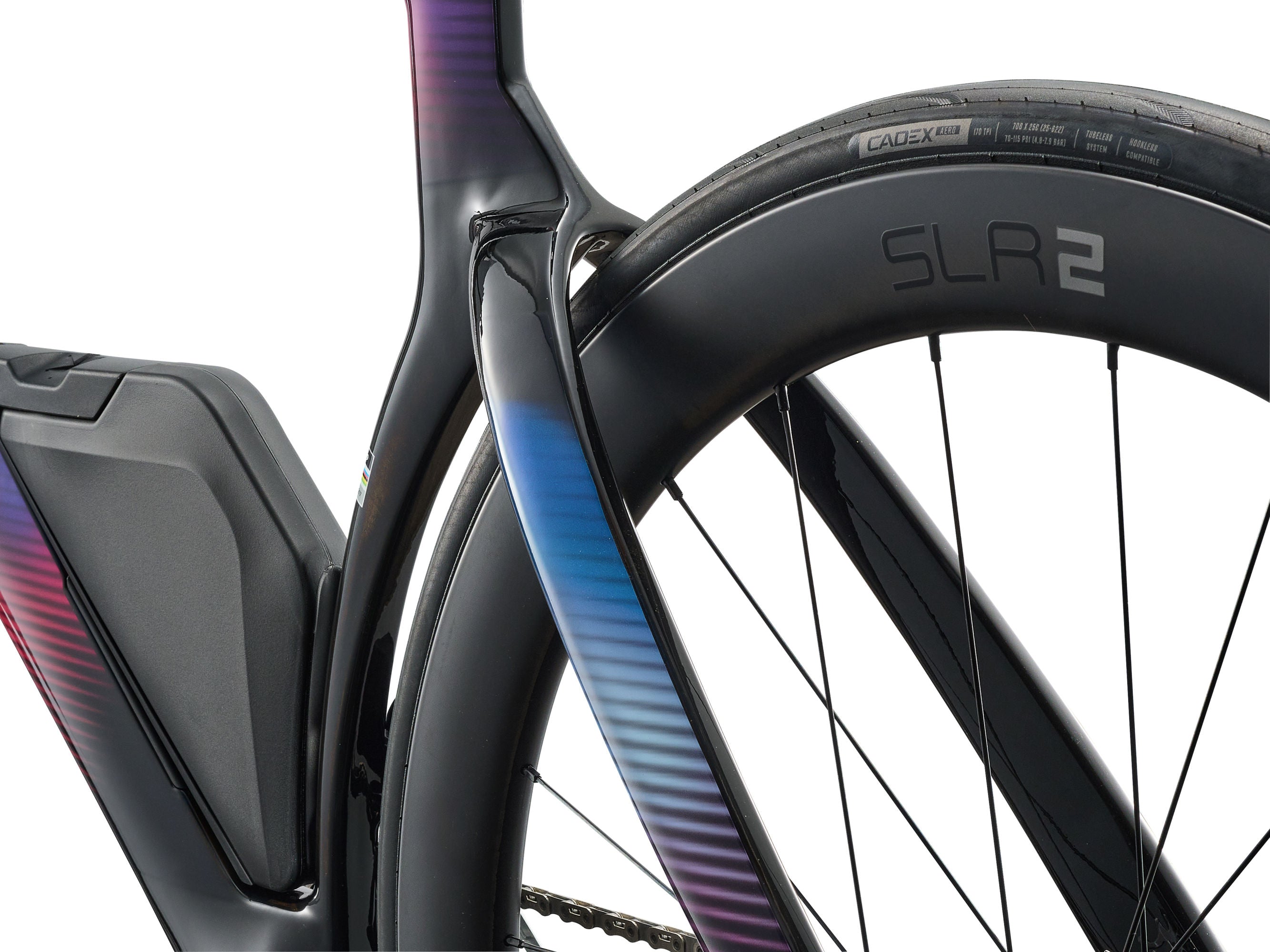 A close up view of a bicycle's seat stays and back wheel.