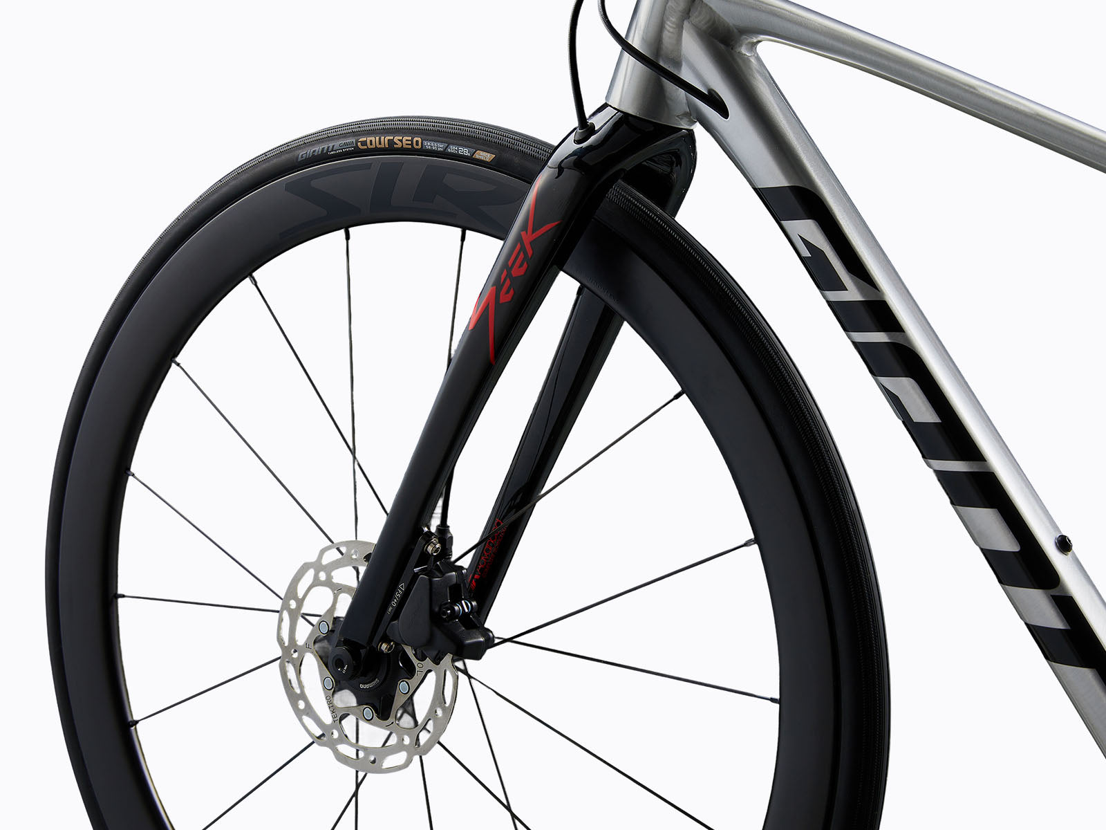 side view of fork of a gray road bike.
