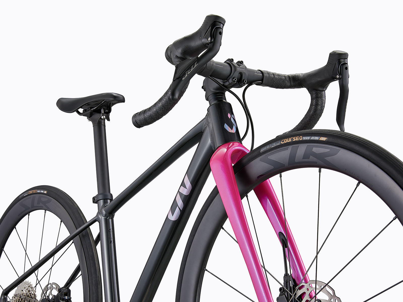 A Black road bike with pink fork.